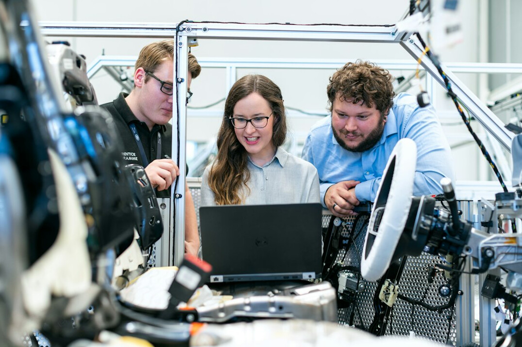 Team of colleagues collaborating around a table