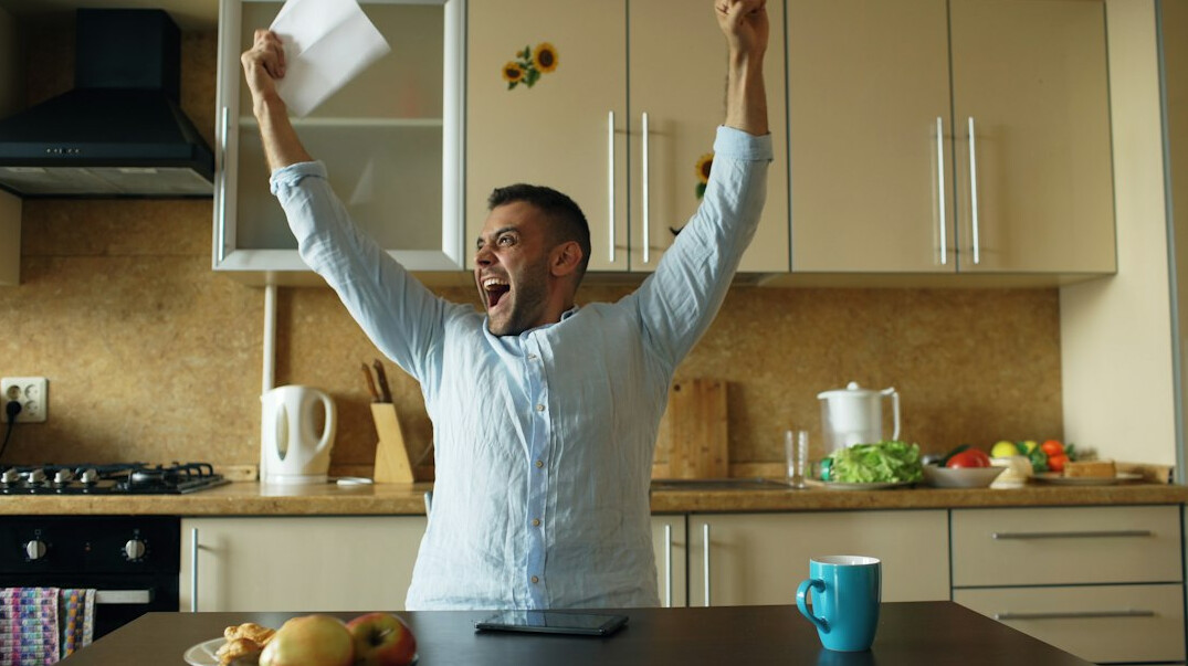 person celebrating new job offer